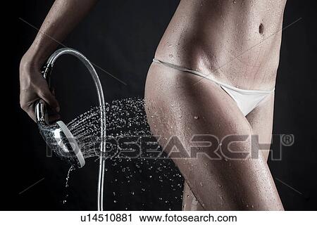 Woman in shower View Large Photo Image Stock Image - Woman in shower. Fotosearch