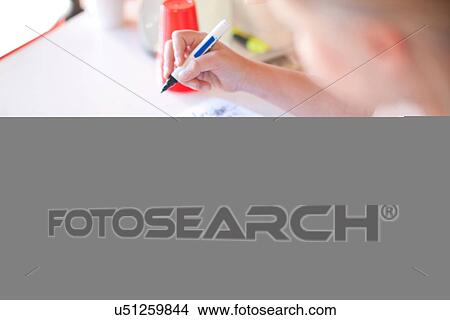 Young girl adding profit from goods View Large Photo Image Picture - Young girl adding profit from goods. Fotosearch