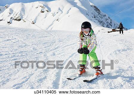 Young girl skiing, Les Arcs, Haute-Savoie, France View Large Photo Image Stock Photography - Young girl skiing, Les Arcs, Haute-Savoie, France. Fotosearch