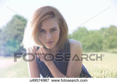 Young woman in sunlight View Large Photo Image Stock Photo - Young woman in sunlight. Fotosearch