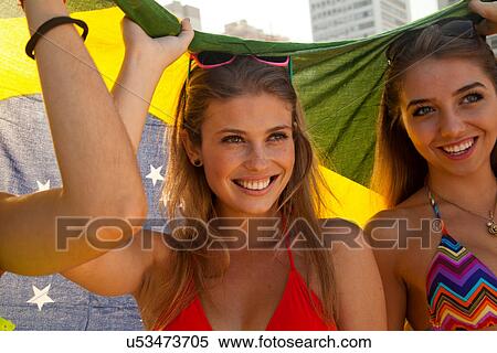 Stock Photography - Young women with Brazilian flag. Fotosearch