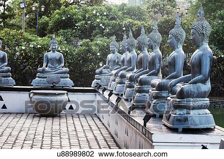 Buddha statues in Gangaramaya Temple View Large Photo Image Stock Image - Buddha statues in Gangaramaya Temple. Fotosearch