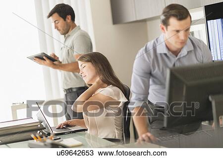 Business people working in office View Large Photo Image Stock Image - Business people working in office. Fotosearch