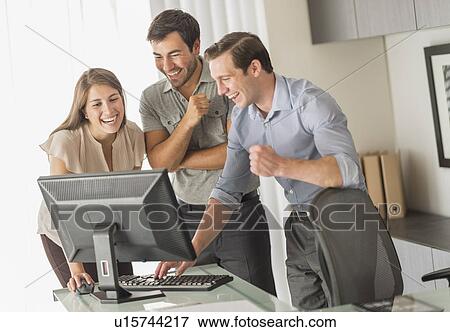Business people working in office View Large Photo Image Stock Photo - Business people working in office. Fotosearch
