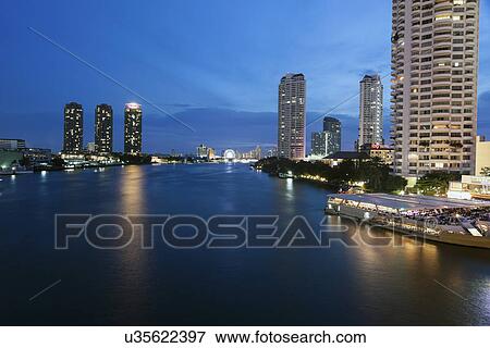 Stock Photo - Chao Phraya River's banks at night. Fotosearch
