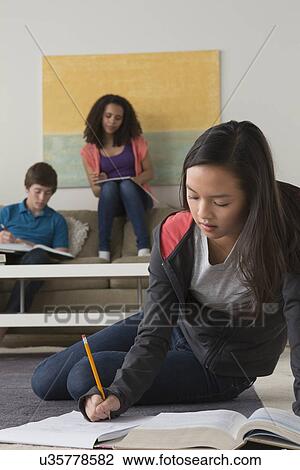 Stock Image - Children (12-13, 14-15, 16-17) at school. Fotosearch