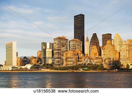 Cityscape at sunset View Large Photo Image Stock Photo - Cityscape at sunset. Fotosearch