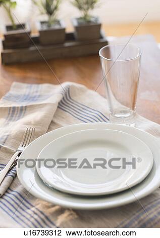 Stock Image - Close up of place setting. Fotosearch