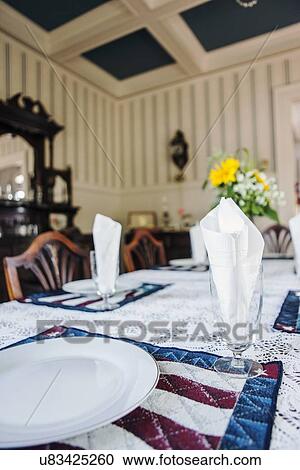 Stock Image - Close-up of table in dining room. Fotosearch