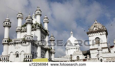 Devatagaha Mosque and town hall against cloudy sky View Large Photo Image Picture - Devatagaha Mosque and town hall against cloudy sky . Fotosearch