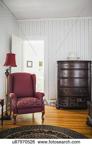 Stock Photograph - Empty room with armchair. Fotosearch