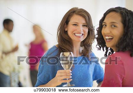 Friends at party View Large Photo Image Stock Photo - Friends at party. Fotosearch