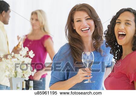 Friends at party View Large Photo Image Stock Photography - Friends at party. Fotosearch