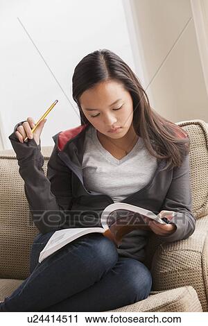 Girl (16-17) studying View Large Photo Image Stock Image - Girl (16-17) studying. Fotosearch