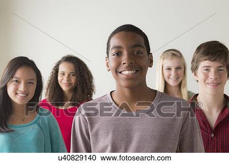 Stock Image - Group of teenagers (12-13, 14-15, 16-17). Fotosearch