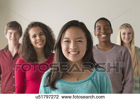 Stock Image - Group of teenagers (12-13, 14-15, 16-17). Fotosearch