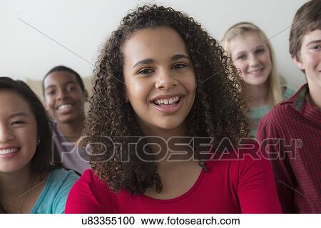 Stock Image - Group of teenagers (12-13, 14-15, 16-17). Fotosearch