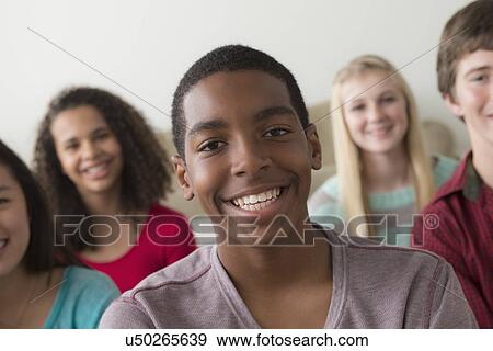 Stock Photo - Group of teenagers (12-13, 14-15, 16-17). Fotosearch