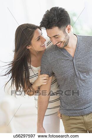 Stock Photo - Happy young couple. Fotosearch