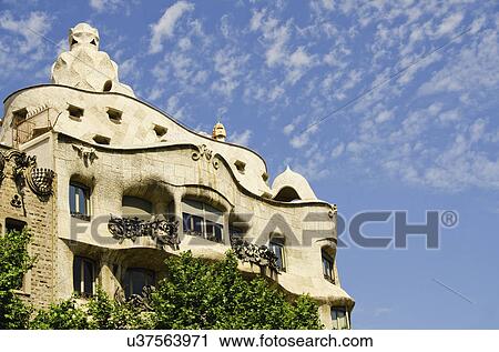 Stock Image - High section of Casa Mila or La Pedrera. Fotosearch