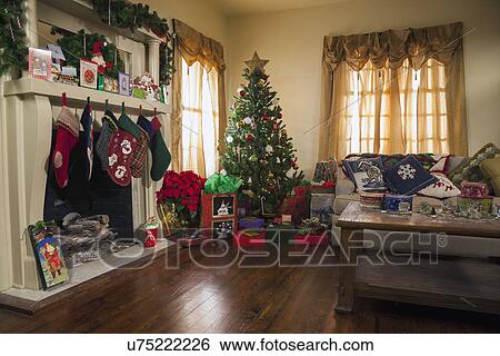 Stock Photograph - Living room decorated for Christmas. Fotosearch