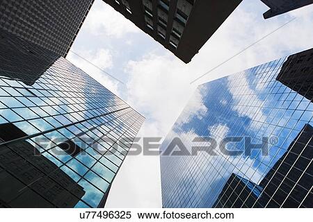 Stock Photography - Low angle view of skyscrapers. Fotosearch
