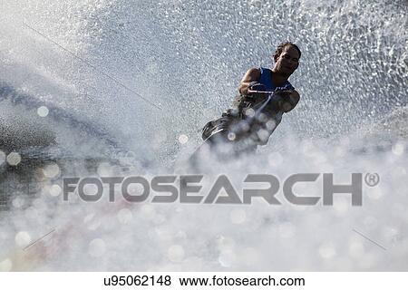 Stock Photo - Man waterskiing. Fotosearch