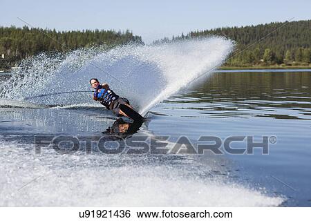 Stock Photograph - Man waterskiing. Fotosearch