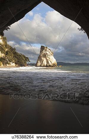 Moody sky over rock formation View Large Photo Image Picture - Moody sky over rock formation. Fotosearch