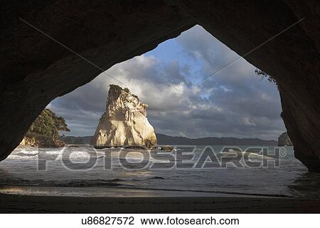 Moody sky over rock formation View Large Photo Image Stock Image - Moody sky over rock formation. Fotosearch