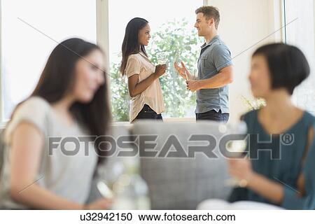 Stock Image - People at party. Fotosearch
