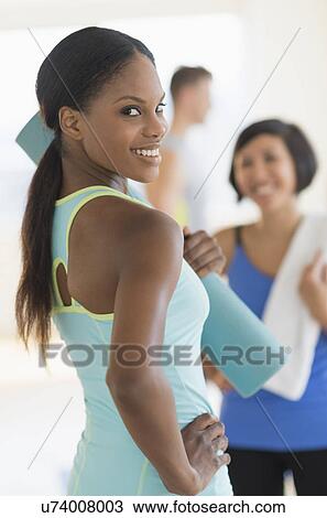 People socializing in gym View Large Photo Image Stock Image - People socializing in gym. Fotosearch