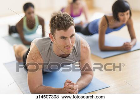 Stock Photo - People training in gym. Fotosearch