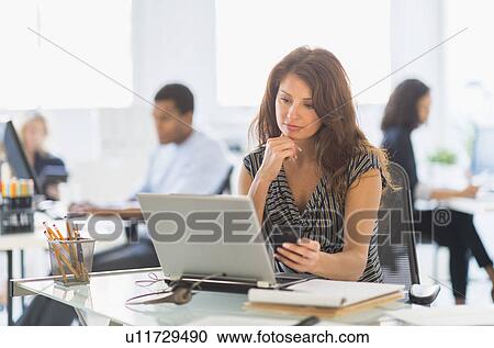People working in office View Large Photo Image Stock Image - People working in office. Fotosearch