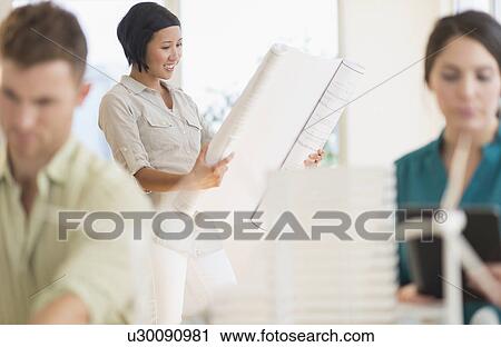 People working in office View Large Photo Image Stock Image - People working in office. Fotosearch