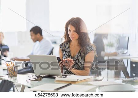 People working in office View Large Photo Image Stock Image - People working in office. Fotosearch