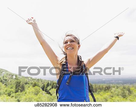 Portrait of athletic woman cheering View Large Photo Image Stock Photo - Portrait of athletic woman cheering. Fotosearch