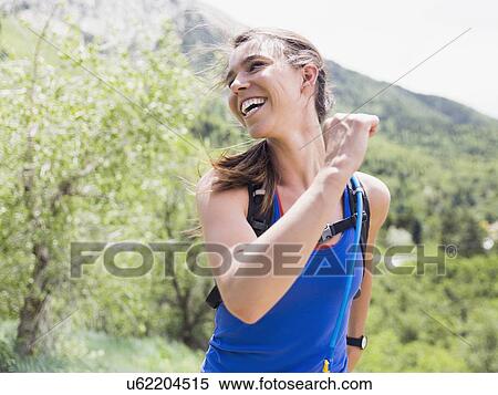 Stock Photography - Portrait of athletic woman running. Fotosearch