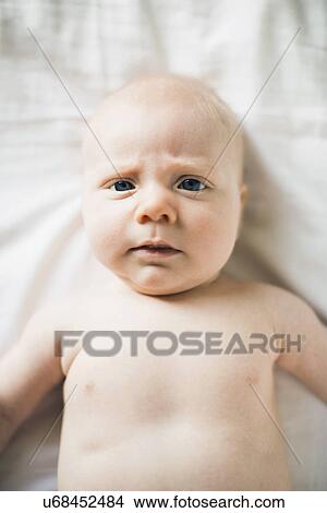 Picture - Portrait of baby boy (2-5 months). Fotosearch