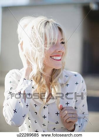 Stock Photography - Portrait of blonde woman. Fotosearch