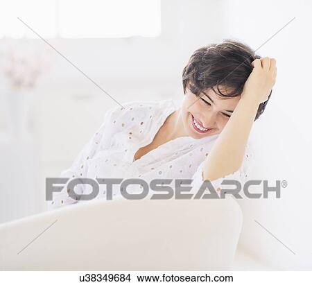 Portrait of cheerful young woman View Large Photo Image Picture - Portrait of cheerful young woman . Fotosearch