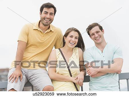 Stock Photo - Portrait of friends hanging out. Fotosearch