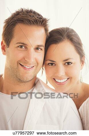 Stock Photo - Portrait of happy couple. Fotosearch