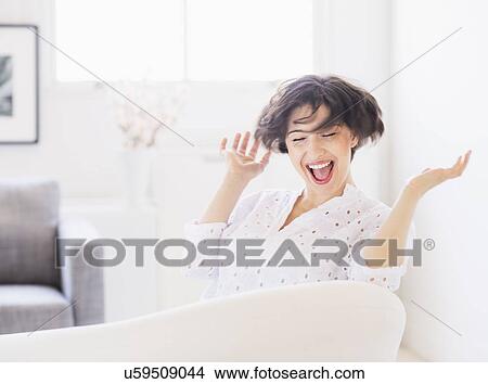 Picture - Portrait of laughing young woman . Fotosearch