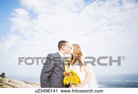Portrait of married couple kissing View Large Photo Image Stock Image - Portrait of married couple kissing. Fotosearch