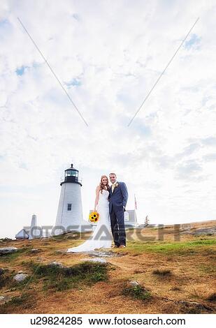 Portrait of married couple, lighthouse in background View Large Photo Image Stock Photography - Portrait of married couple, lighthouse in background. Fotosearch