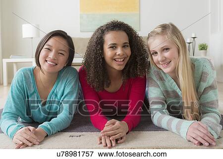 Stock Photo - Portrait of school friends (12-13, 14-15, 16-17). Fotosearch