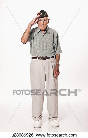 Portrait of senior man standing and saluting at camera View Large Photo Image Stock Photograph - Portrait of senior man standing and saluting at camera. Fotosearch