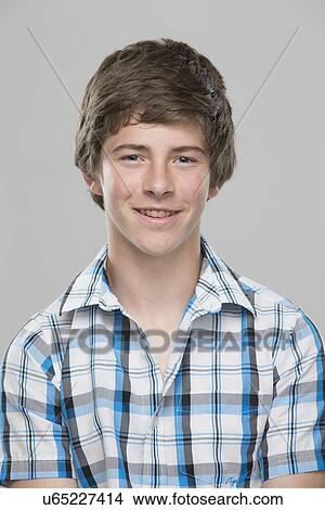 Picture - Portrait of teenage boy (14-15) smiling. Fotosearch