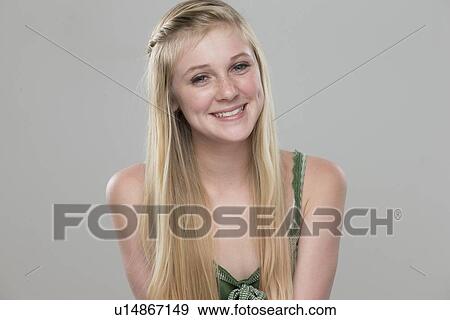 Portrait of teenage girl (14-15) smiling View Large Photo Image Stock Photo - Portrait of teenage girl (14-15) smiling. Fotosearch